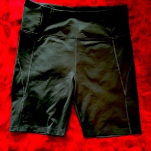 Girlfriend collective high rise bike short in moss. US XL